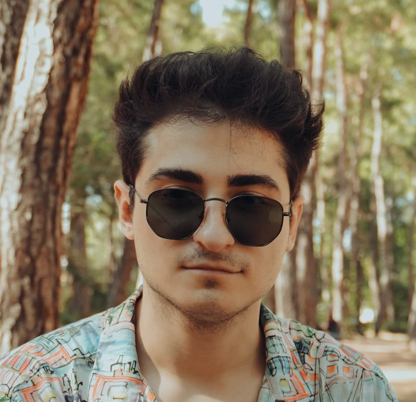 Man in sunglasses and patterned shirt